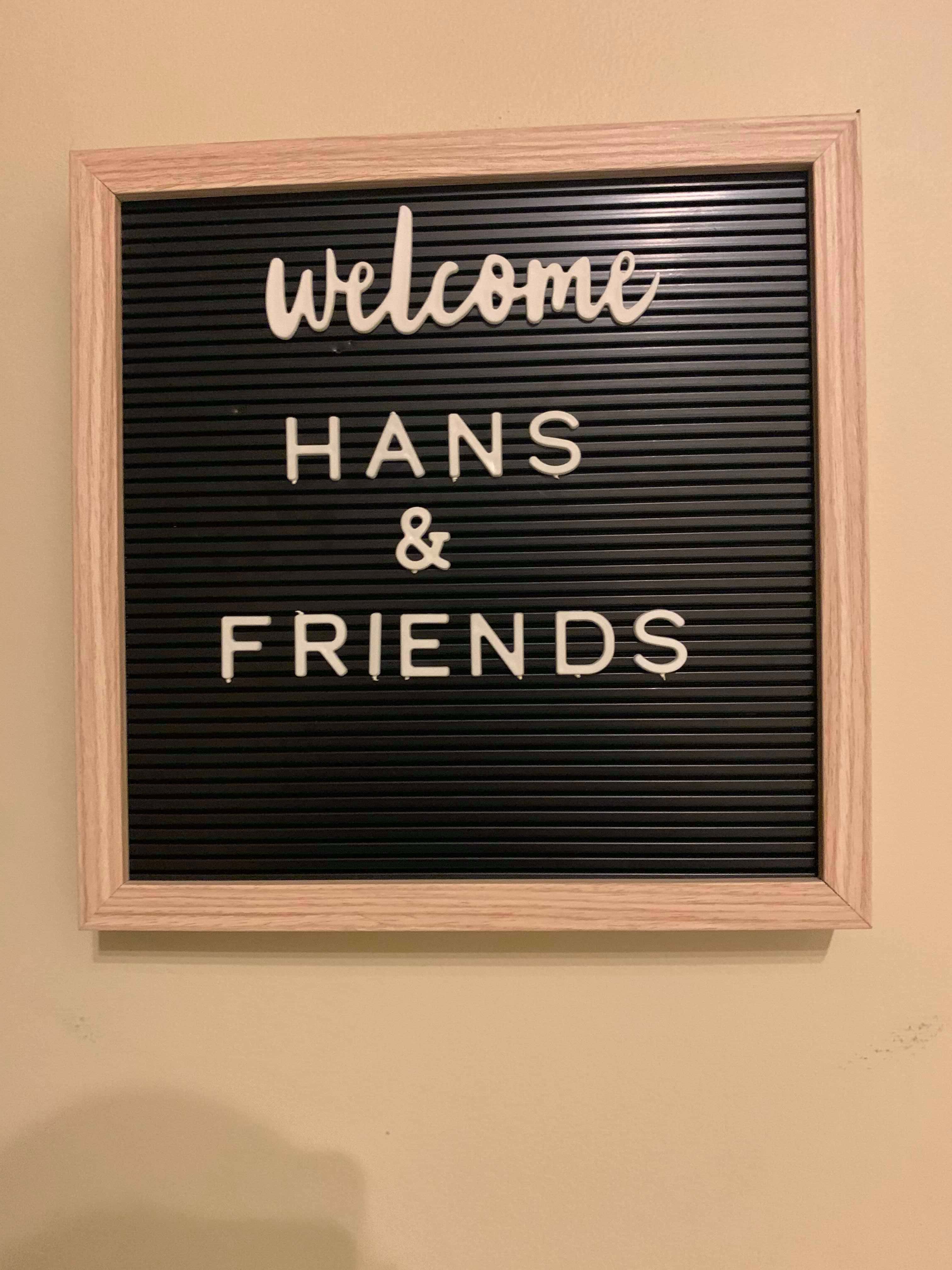 Welcome Hans & Friends board at our Airbnb
